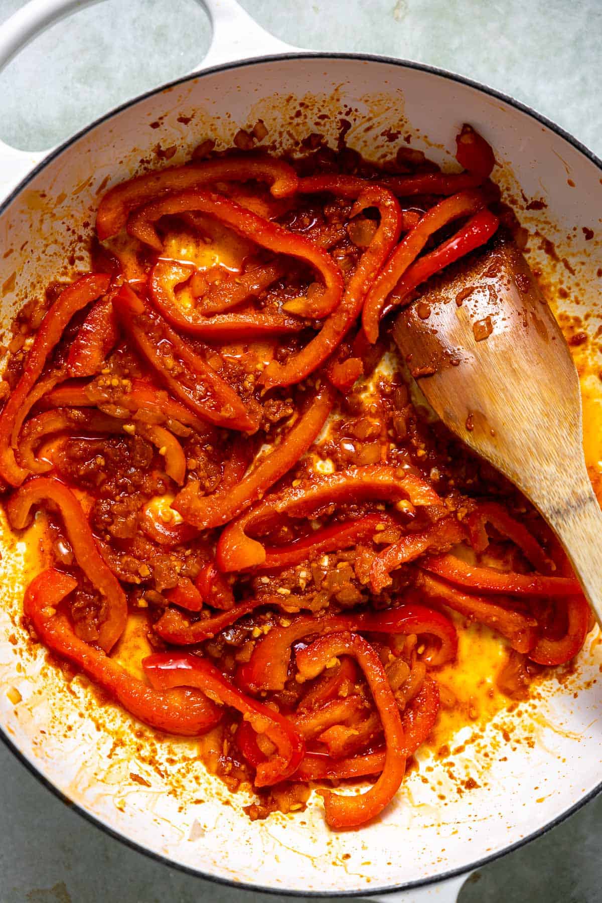 sauteed red bell peppers in curry paste, ginger, and garlic.